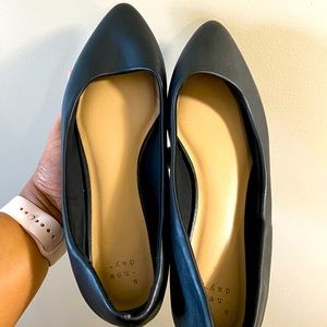 Black pointed ballet flats